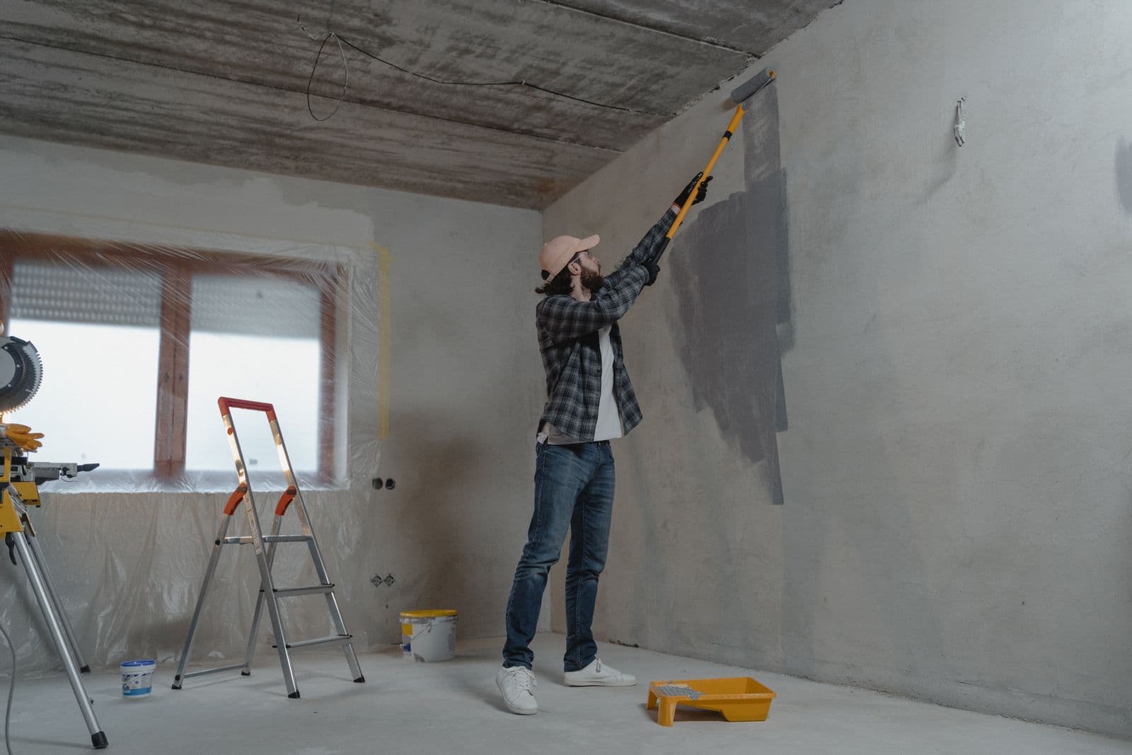 Professional painter finishing an interior wall